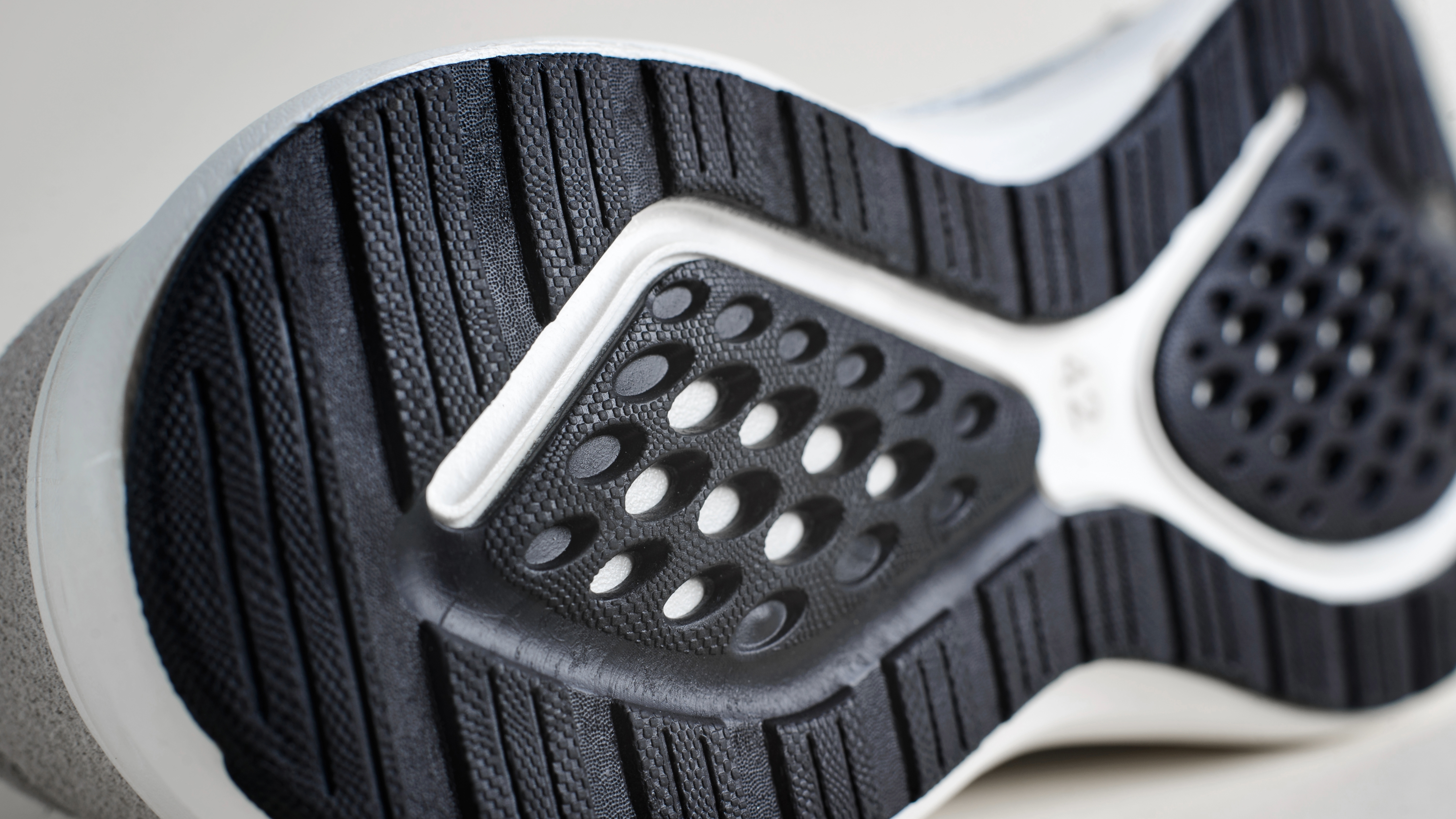 Close-up of a black textured sole of a shoe.