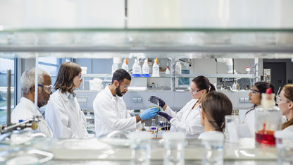Scientists work in laboratories.