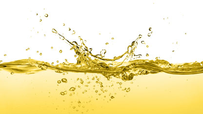 Cooking oil splash isolated on white