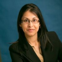 A professional headshot of Sandra Dowlat