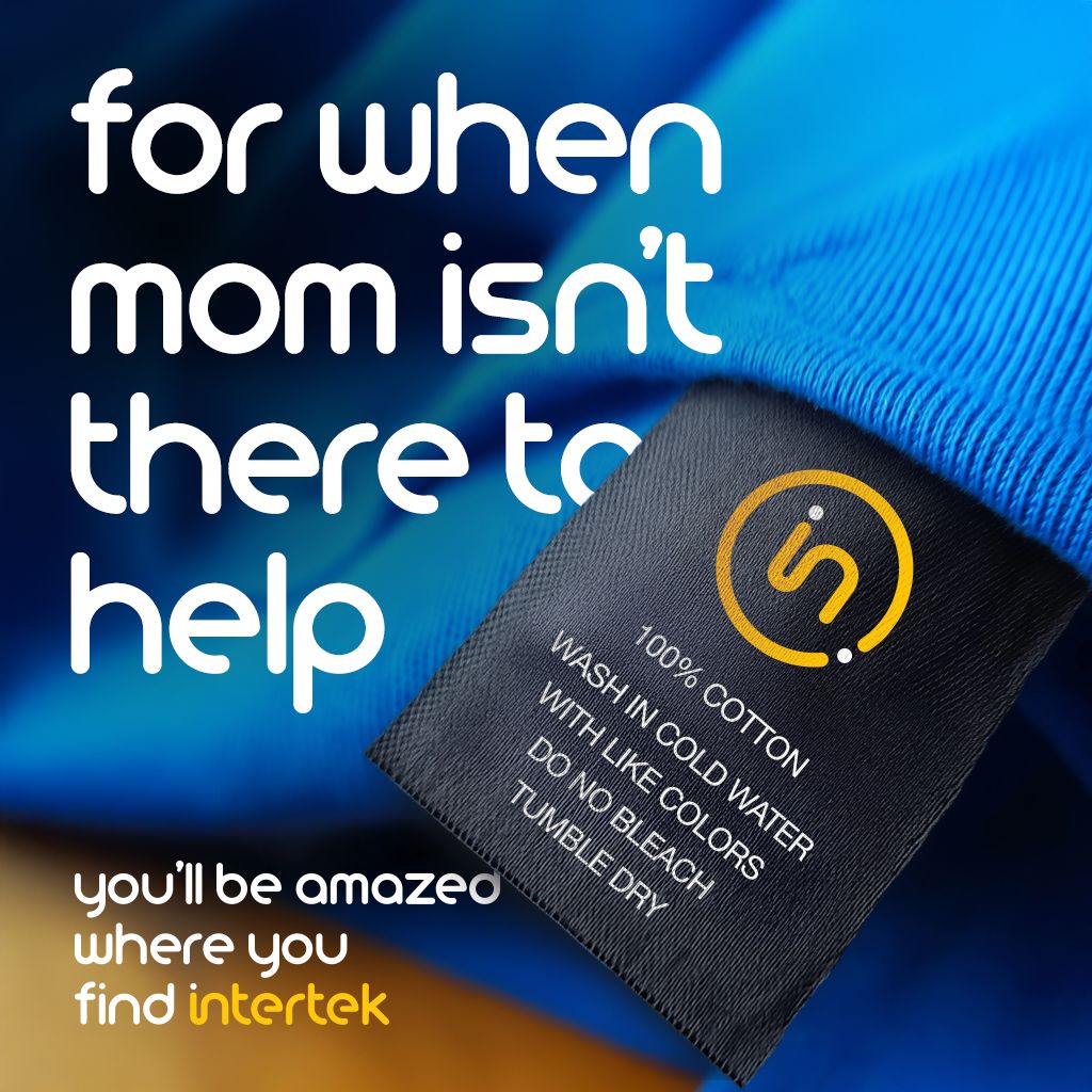 Garment care label attached to a blue knit sweater