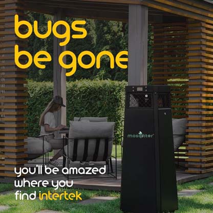 A mosquito control device next to a woman sitting at her patio