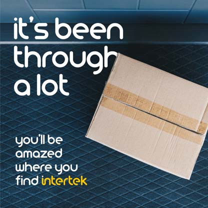 A cardboard box sitting at a doorstep