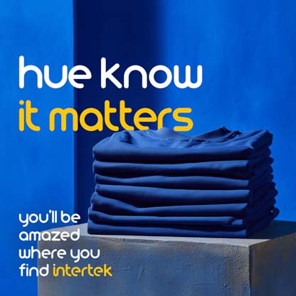 Blue-colored folded shirts on a pedestal